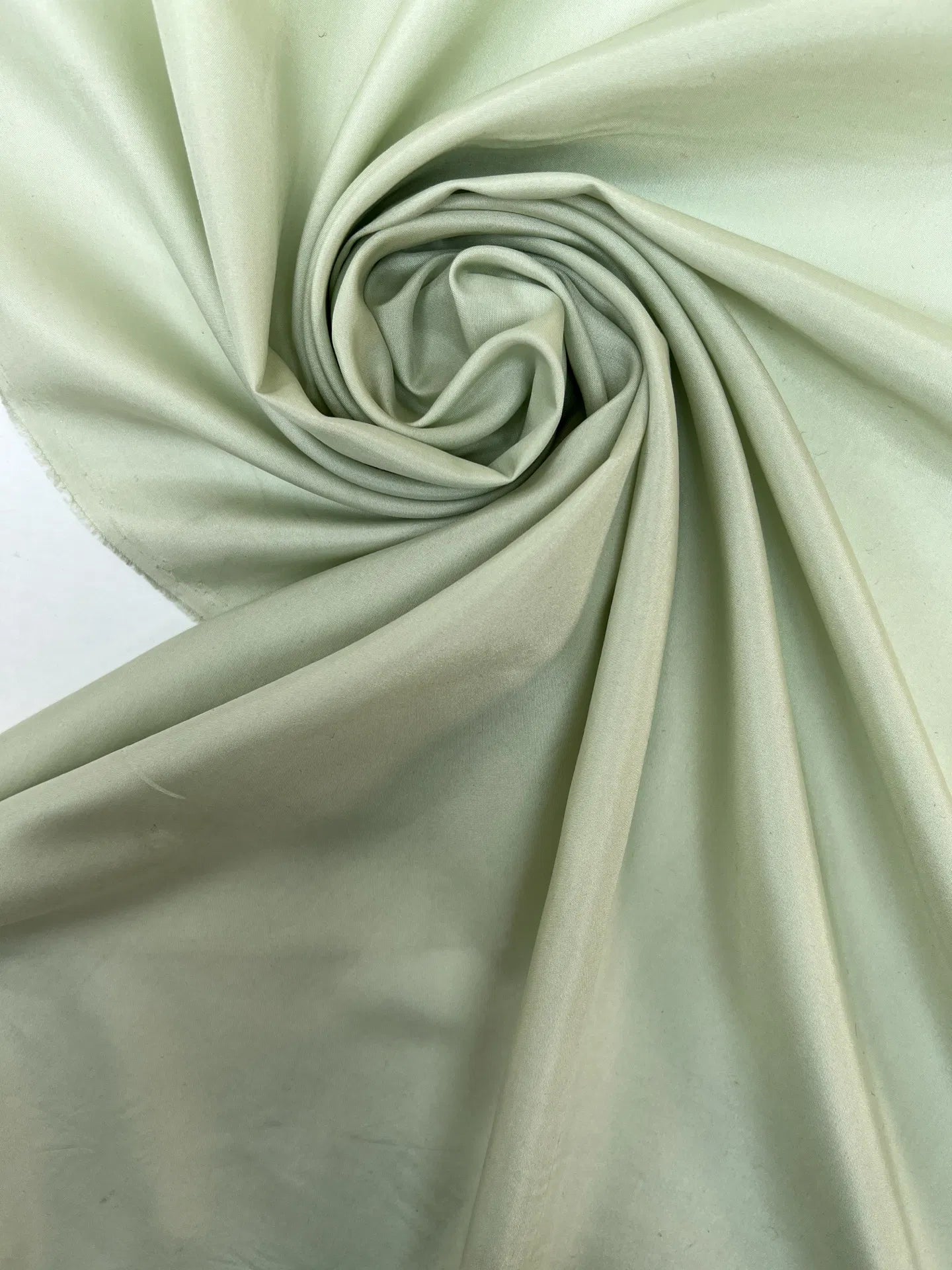 100% Zīda satīns - pasteļu zalš 50 g/m²