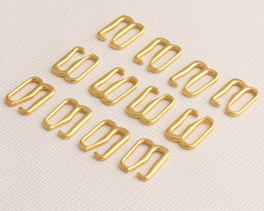 Metalo reguliatorius-kablys skalbiniams 12 mm-aukso spalvos (10 vnt. pakuotėje)