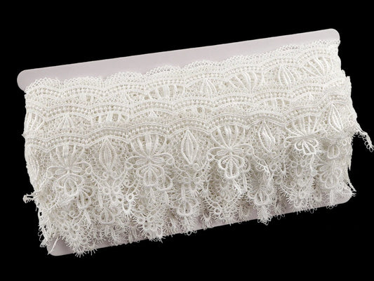 Decorative guipure lace 65 mm white – available online at Charlotte's Fabrics
