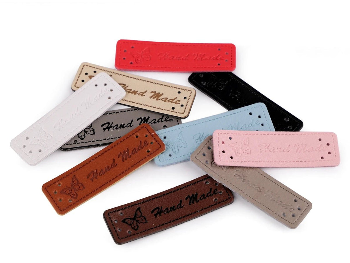 Etikečių „Hand Made“ 15x50 mm – baltos, galima įsigyti internetu „Šarlotes audumi“