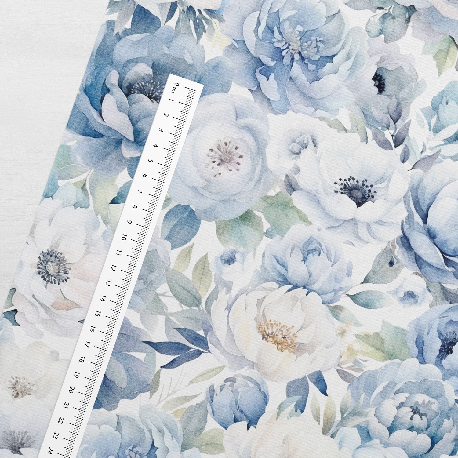 Kokvilnas cilpiņtrikotāža - zili un balti ziedi 250 g/m²