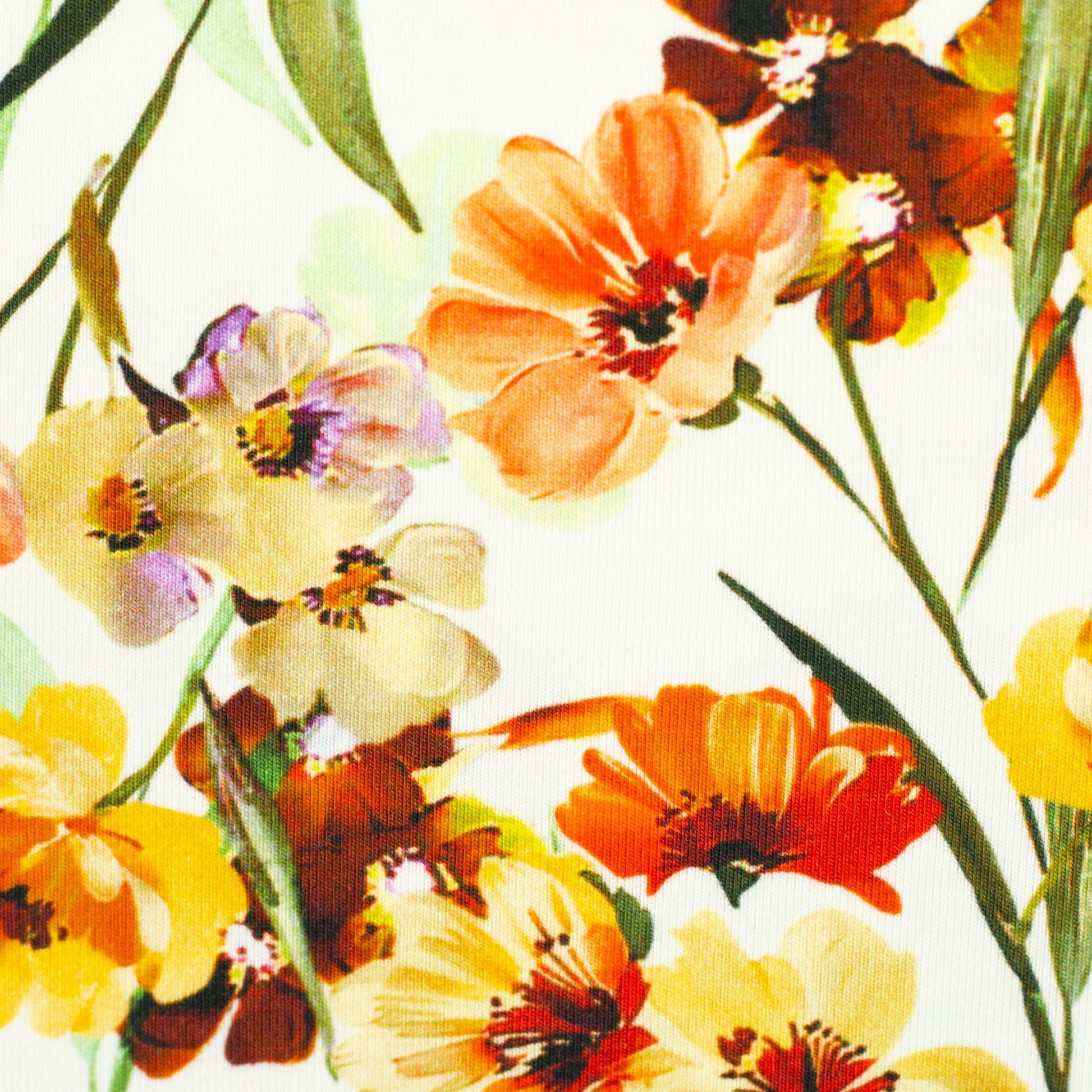 Kokvilnas trikotāža - dzeltenie ziedi 220 g/m²