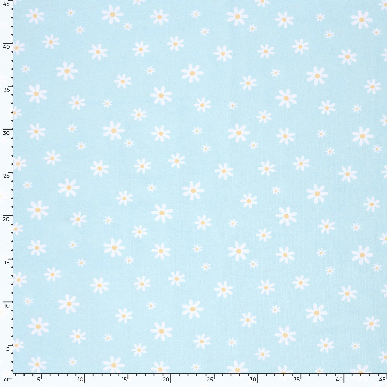 Kokvilnas trikotāža - margrietiņas uz gaiši zila fona 210 g/m²