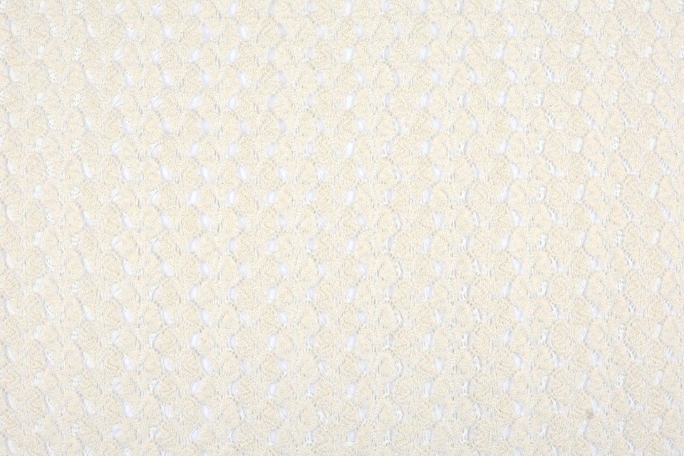 Mežģīņu audums - piena balts ar zelta akcentiem 170 g/m²