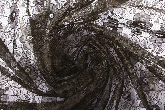 Attēls ar Mežģīņu audums smalks - šokolādes brūni ziedi 75 g/m² – pieejams Šarlotes audumi