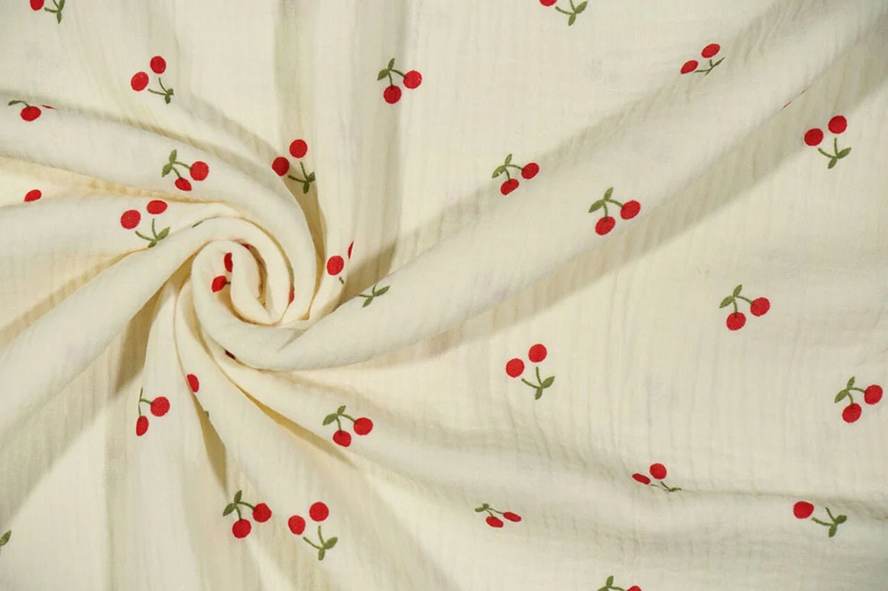 Muslīns - ķirši uz sviesta dzeltena fona 125 g/m²