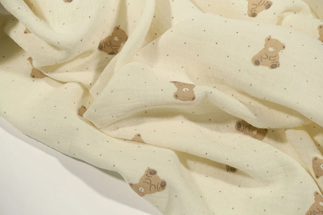 Muslīns - lācīši uz sviesta dzeltena fona 125 g/m²