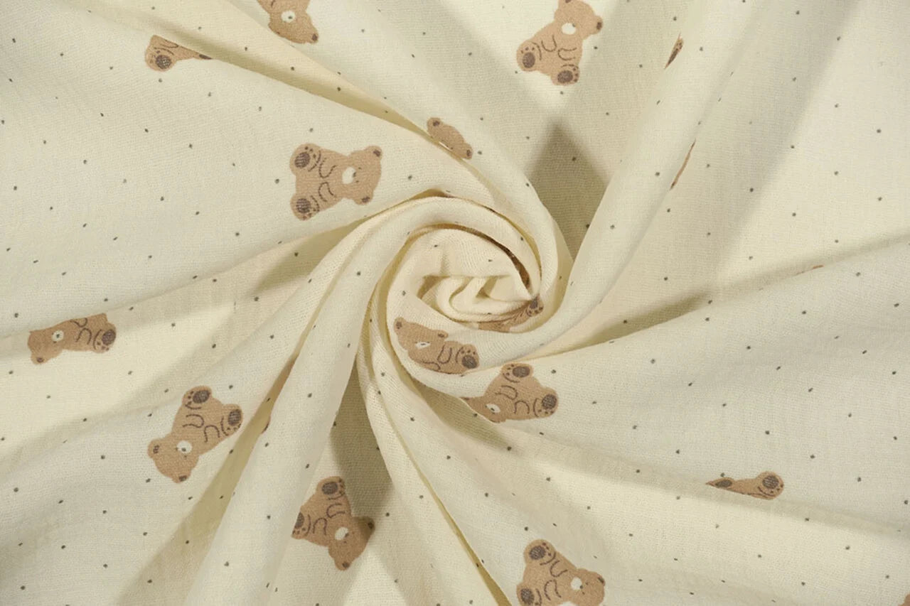 Muslīns - lācīši uz sviesta dzeltena fona 125 g/m²