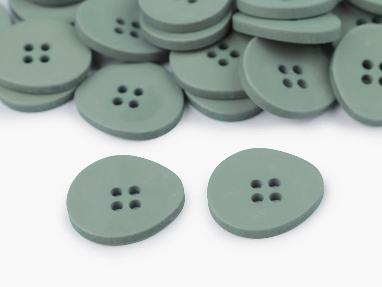 Image of plastic buttons 20 mm|in assorted shades – available at Charlotte's Fabrics