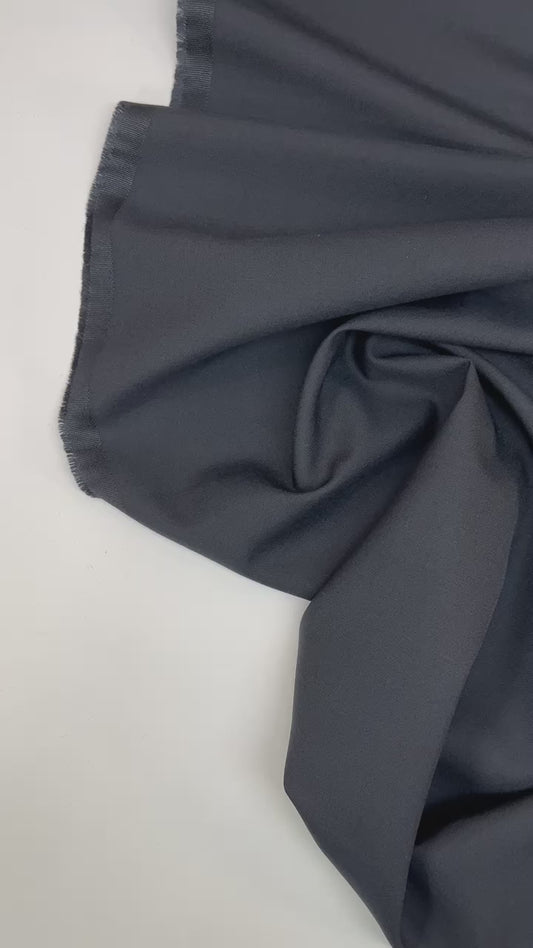 Italijos Oxford kostiuminė medžiaga | 73 % vilna | 27 % poliamidas | 340 g/m² | 154 cm | Tamsiai mėlyna