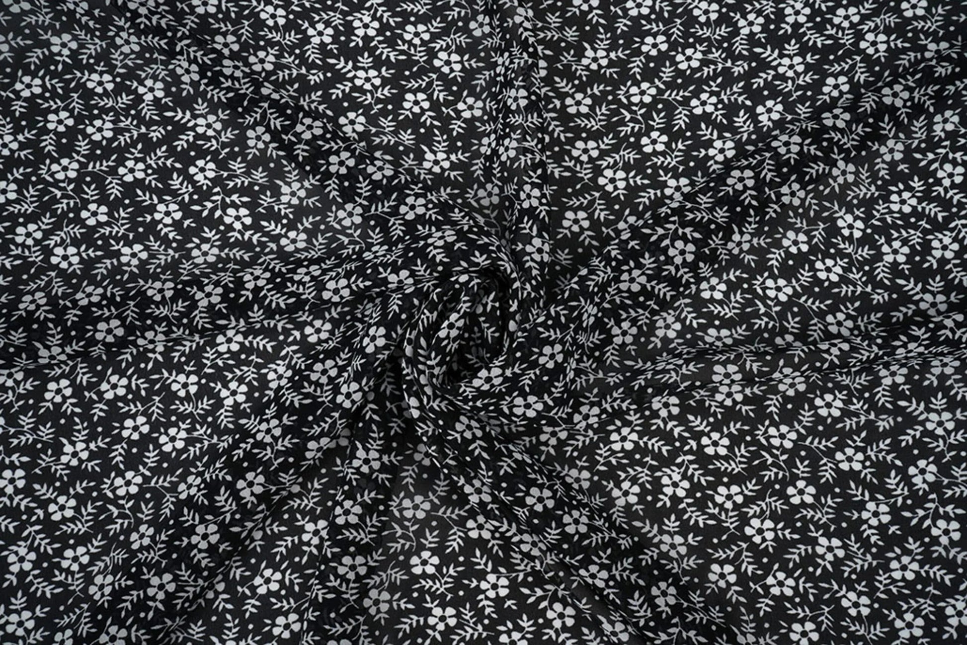 Šifons - balti ziediņu uz melna fona | 150 cm | 65 g/m²