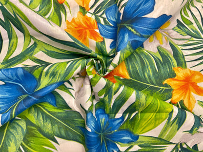 Tissu 100 % coton - fleurs tropicales orange sur fond bleu 125 g/m