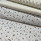 100% Kokvilnas audums - smalkas brūnas rozītes 125 g/m²