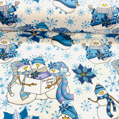 Tissu 100 % coton - bonhomme de neige avec chapeau bleu sur fond blanc 130 g/m²