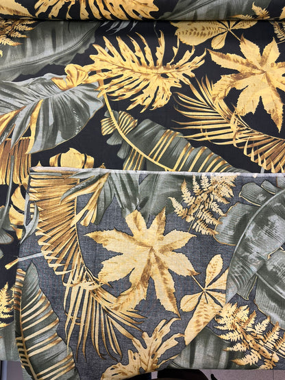 Image de tissu 100 % coton à feuilles sombres 125 g/m² – disponible chez Šarlotes audumi