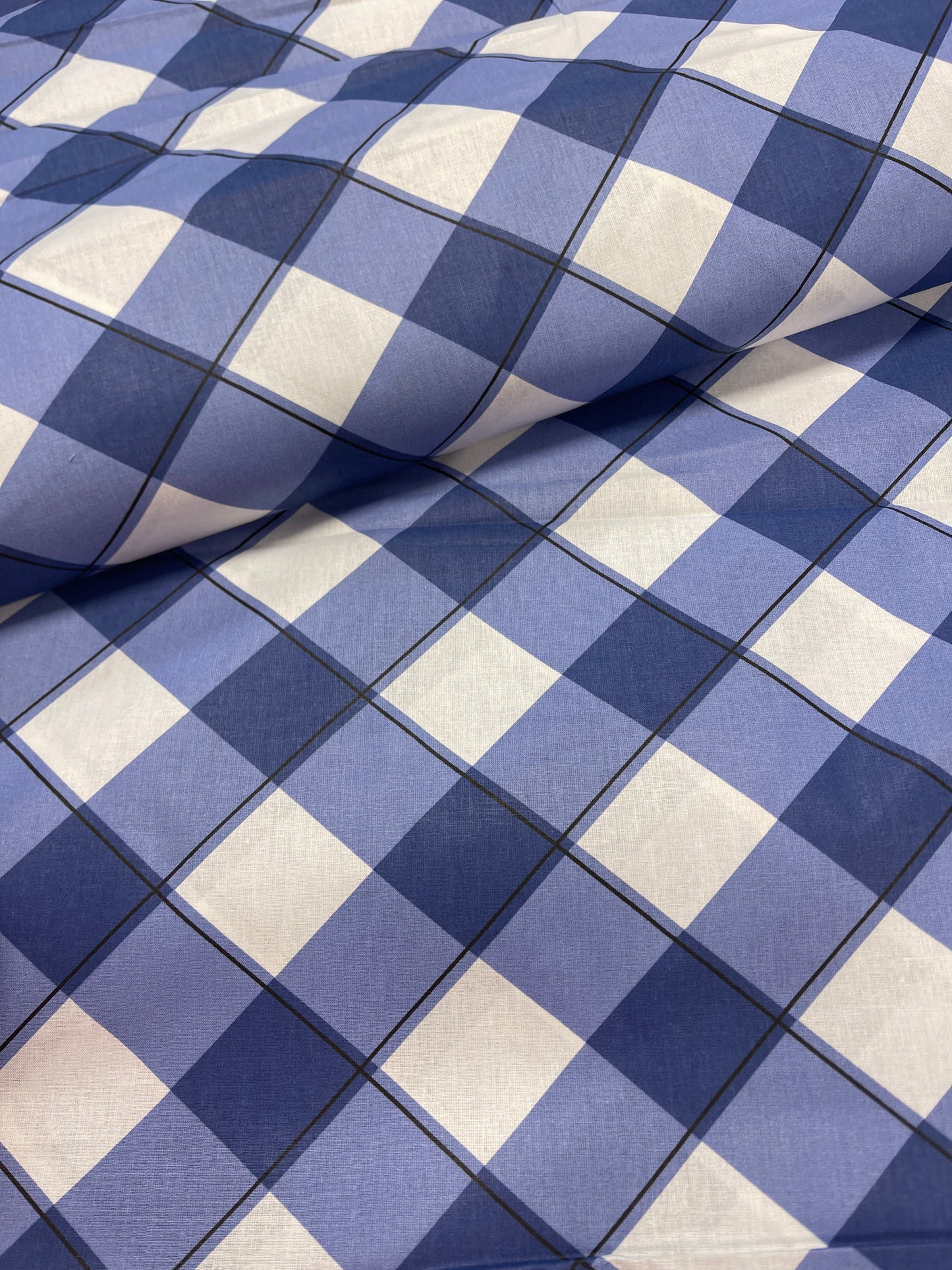 Attēls ar 100% Kokvilnas audums - zils rūtains 125 g/m² – pieejams Šarlotes audumi