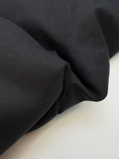 Black cotton suiting fabric with elastane and moiré effect – Italy