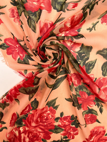 Polyamide crepe fabric with red floral pattern on a beige background – Italy