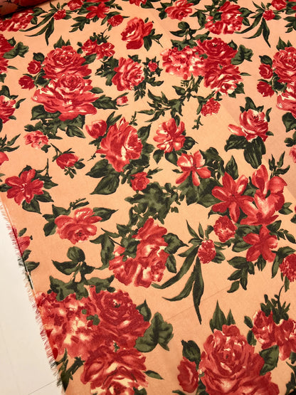 Polyamide crepe fabric with red floral pattern on a beige background – Italy