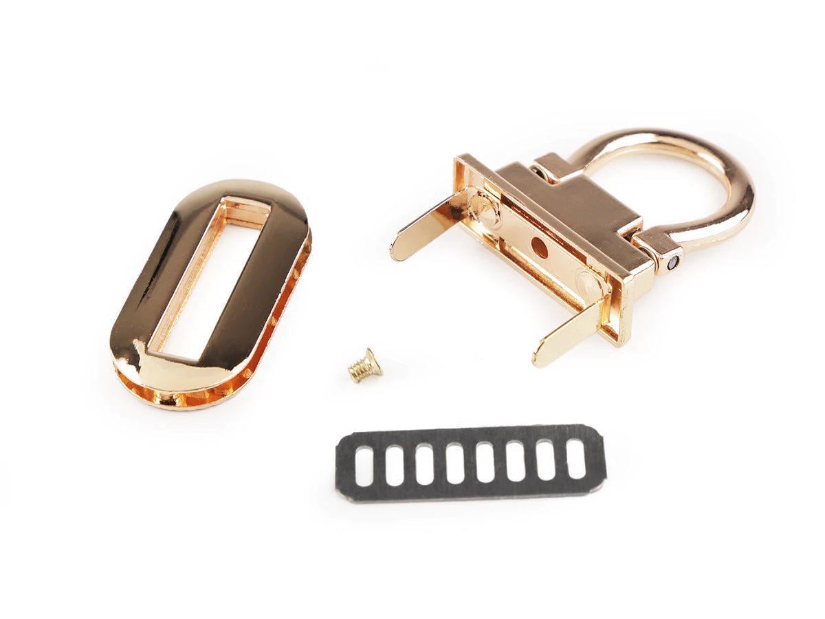Metalinė rankinės sagtis / užraktas 20 × 42 mm – auksinės spalvos