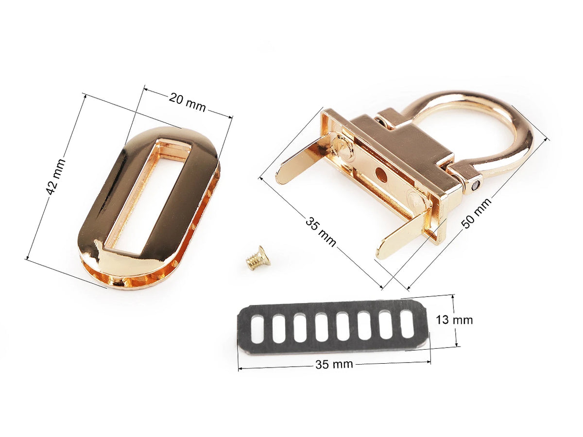 Metalinė rankinės sagtis / užraktas 20 × 42 mm – auksinės spalvos