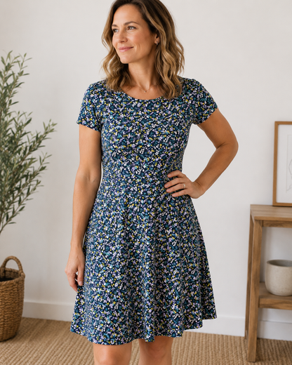 Cotton jersey with delicate flowers on a dark blue background - GOTS certified