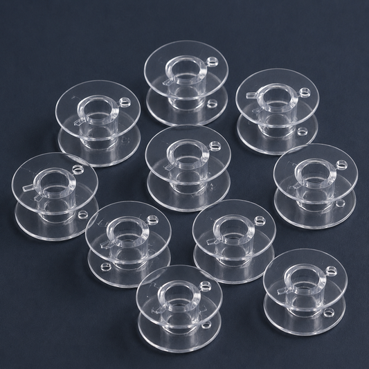 Plastikinė plokščia ritė siuvimo mašinoms Ø 20,4 mm – 10 vnt. rinkinys