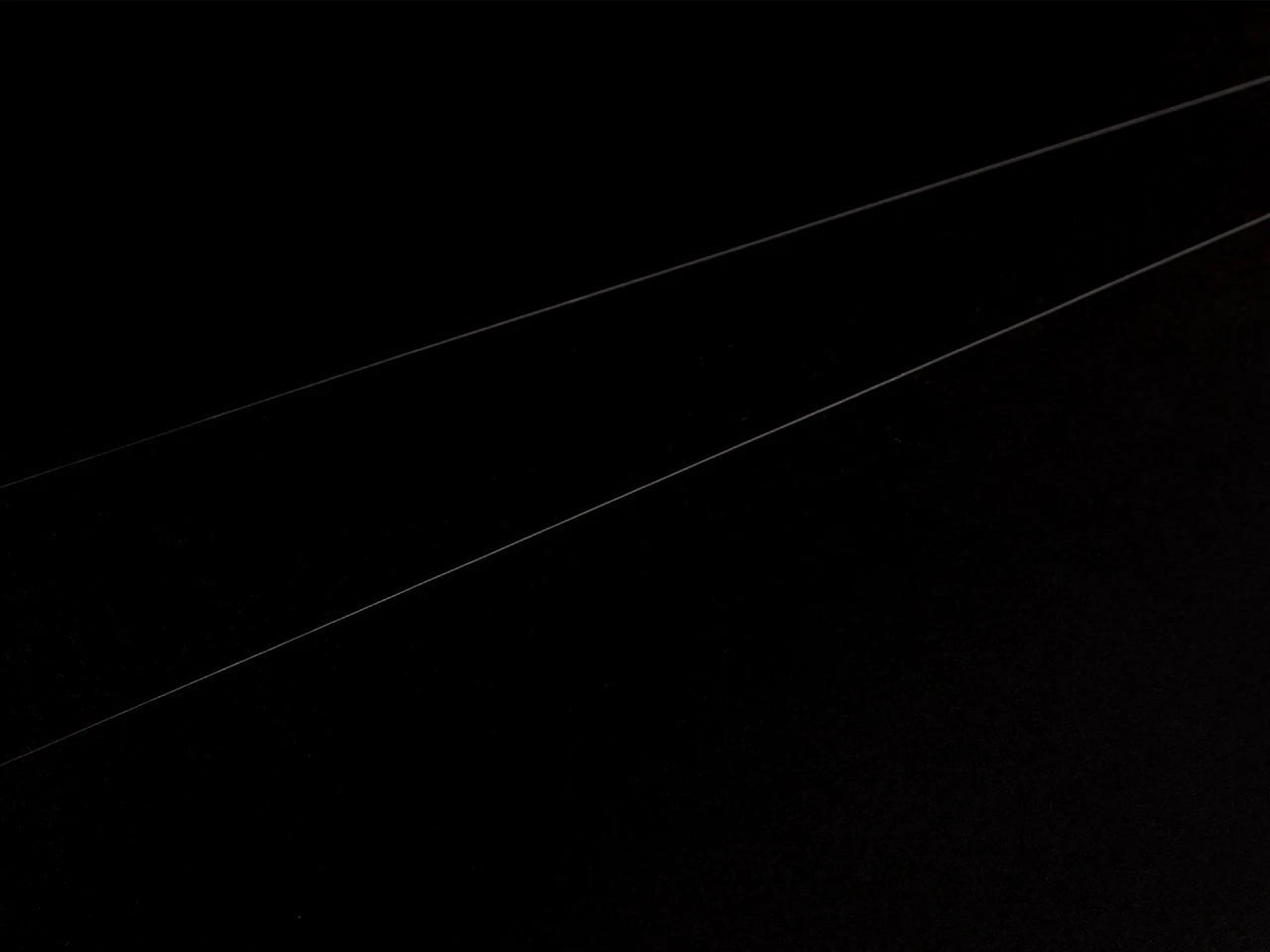 Paveikslėlis su permatomu nailoniniu monofilamentiniu siūlu siuvimui – 0,1 mm × 6000 m – galima įsigyti internetu Šarlotes audumi