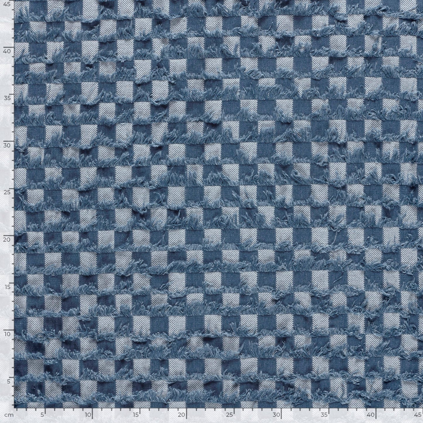 Attēls ar Džinsu audums - rūtains ar bārkstim 345 g/m² – pieejams Šarlotes audumi