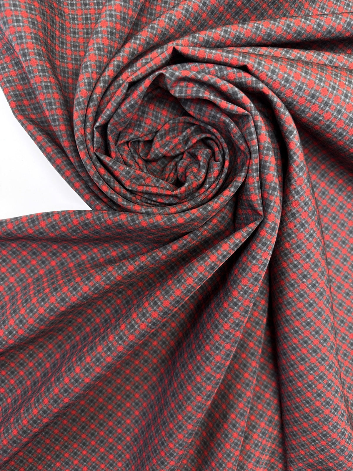 Image of Italian 100% viscose fabric in a red-gray pattern – available online at Charlotte's Fabrics