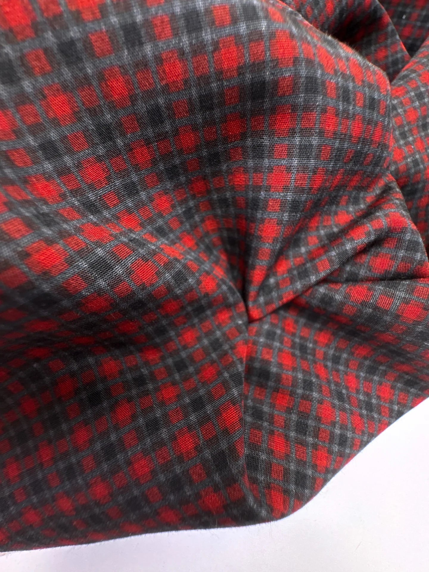Image of Italian 100% viscose fabric in a red and gray pattern – available online at Charlotte's Fabrics