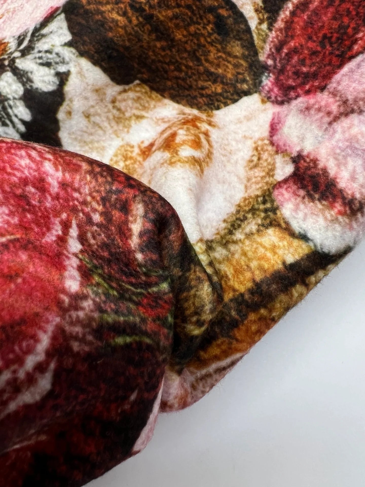 Attēls ar Itālijas divkāršā pinuma audums mēteļiem – daudzkrāsains ziedu raksts | 55% poliamīds, 45% akrils | 420 g/m² | 145 cm – pieejams Šarlotes audumi