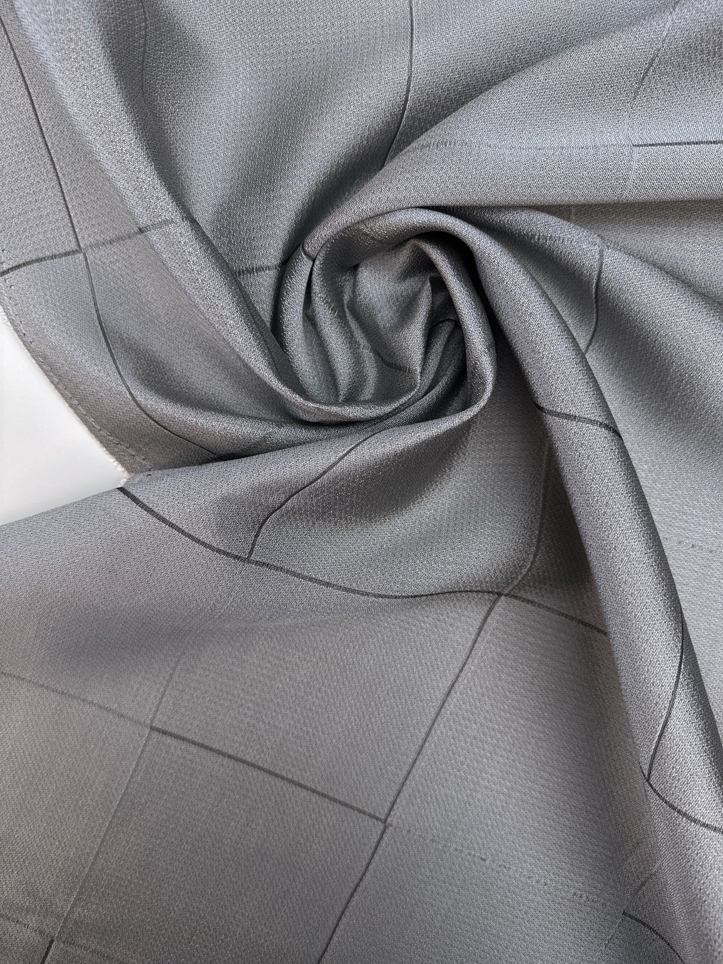 Image of Italian viscose and silk fabric in a gray plaid pattern – available online at Charlotte's Fabrics