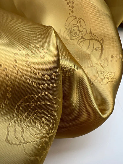 Image of Italian viscose jacquard fabric in a golden tone – available online at Šarlotes audumi