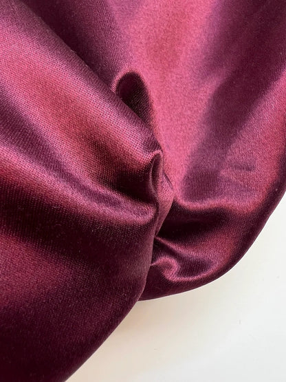Attēls ar Italian silk and cotton satin fabric in a dark purple shade – available online at Charlotte’s fabrics