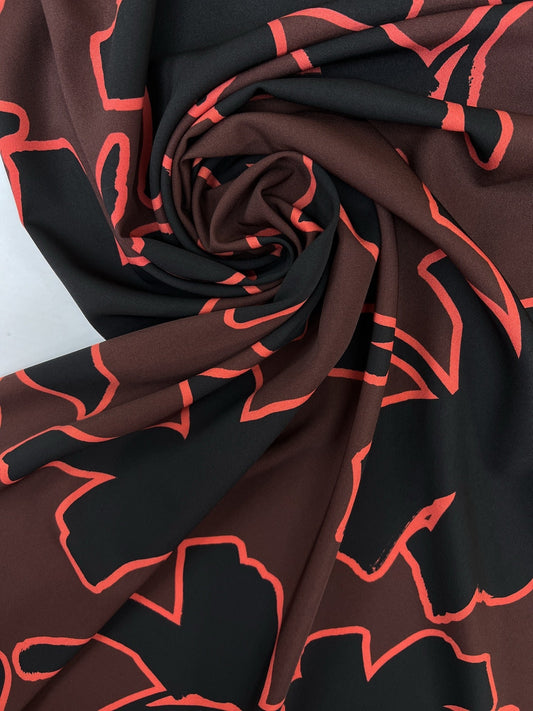 Attēls ar Itāļu elastīgs audums ar abstraktu rakstu | Poliesters 98% Elastāns 2% | 148 cm | Brūns & Melns | Neliels defekts – pieejams Šarlotes audumi