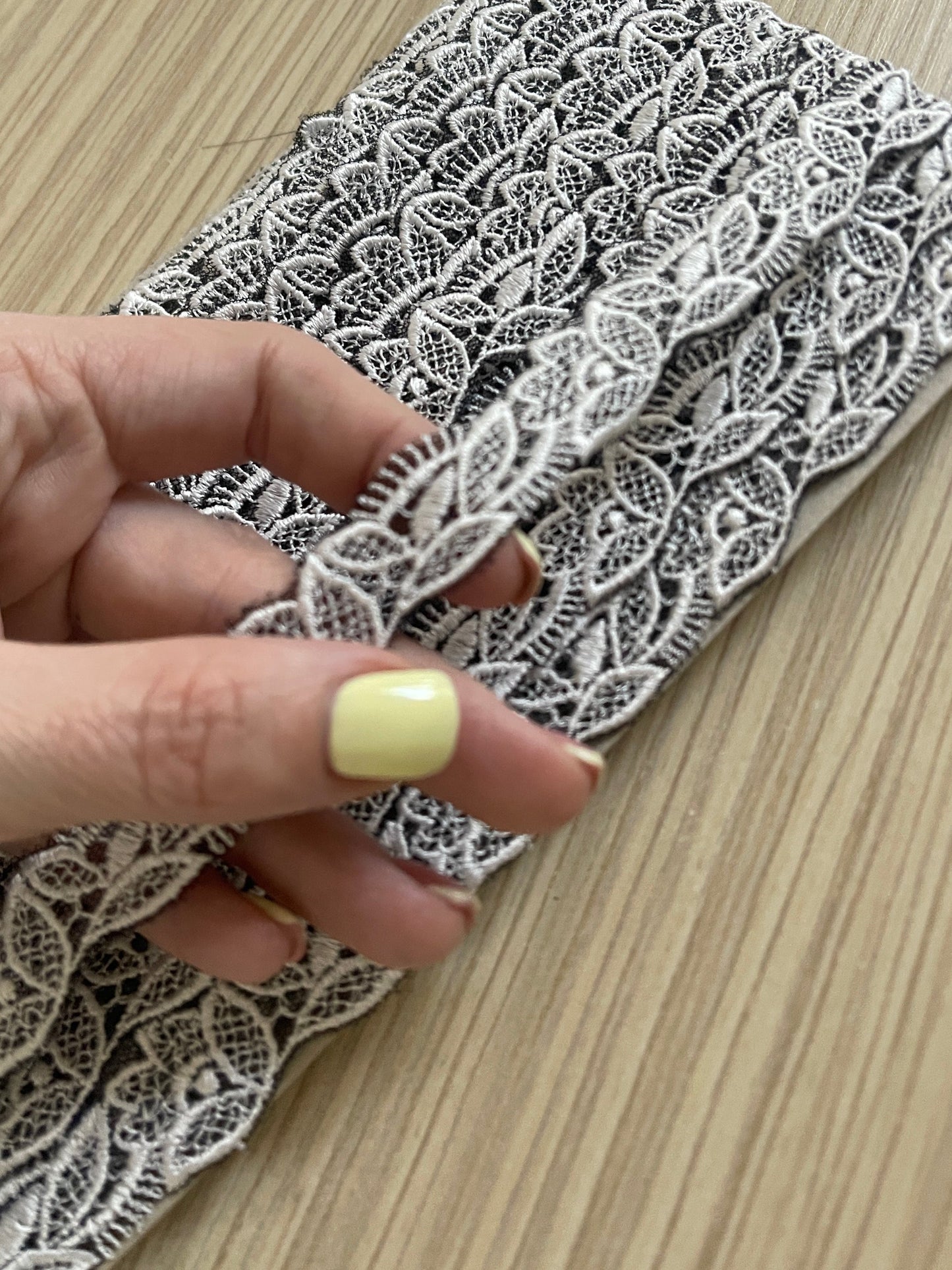 Image of embroidered lace ribbon 2 cm - white with black accents - available at Charlotte's Fabrics