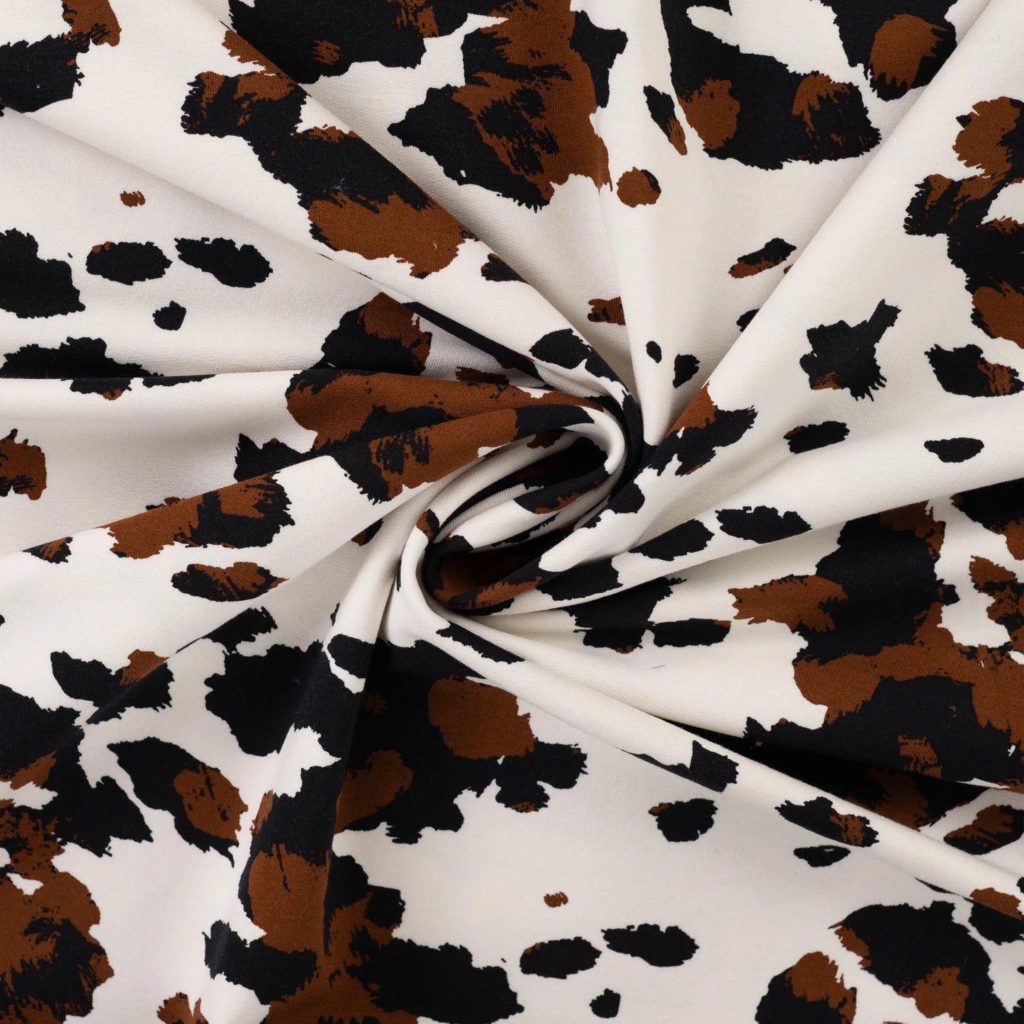 Attēls ar Kokvilnas cilpiņtrikotāža ar siltinājumu - govs raksts 230 g/m² – pieejams Šarlotes audumi