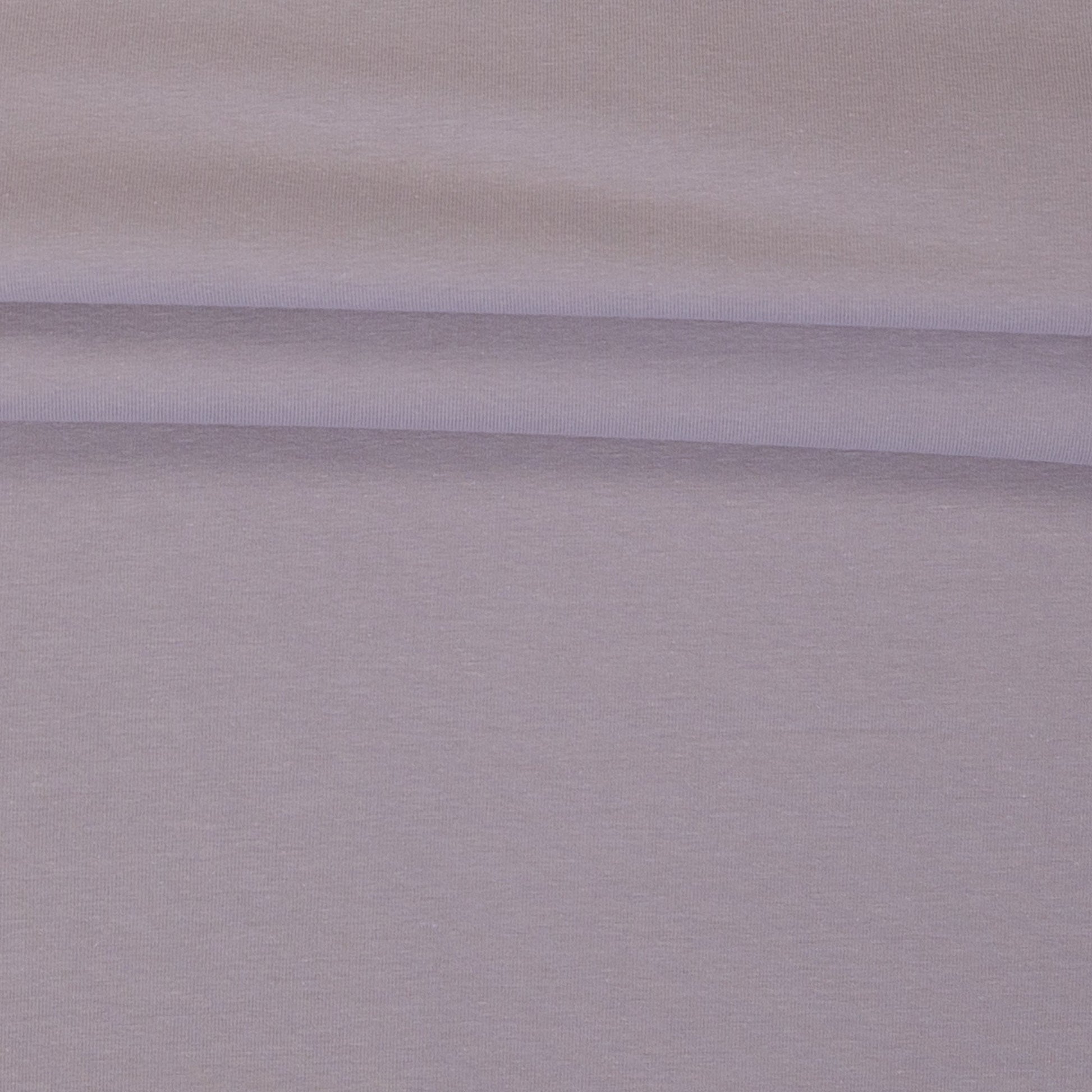 Image with cotton loopback jersey fabric in smoky lilac pink – available online at Šarlotes audumi