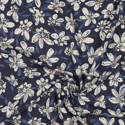 Maille bouclée en coton - motif floral bleu 225 g/m²