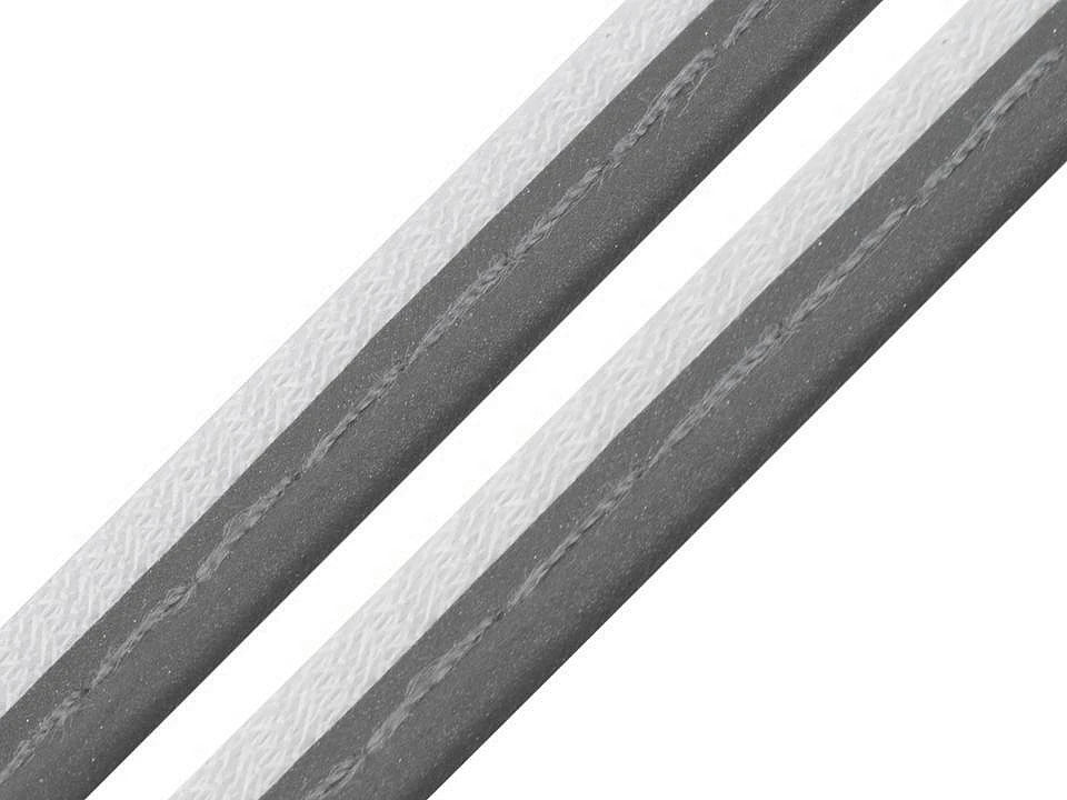 Attēls ar Kokvilnas lentīte, apmalojuma lente ar aukliņu 10 mm - atstarojoša – pieejams Šarlotes audumi