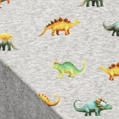Paveikslėlis su medvilne pašiltintu trikotažu | Alpen fleece su dinozaurais ant pilko – galima įsigyti internetu Šarlotes audumi