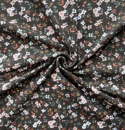 Image avec jersey de coton - petites fleurs sur fond brun foncé 200 g/m² – disponible chez Šarlotes audumi