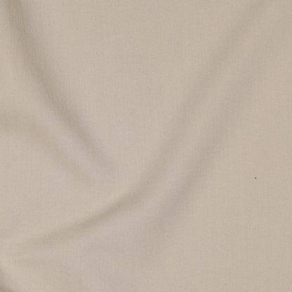 Image d’un tissu pour costume avec élasthanne - beige 200 g/m² – disponible chez Šarlotes audumi