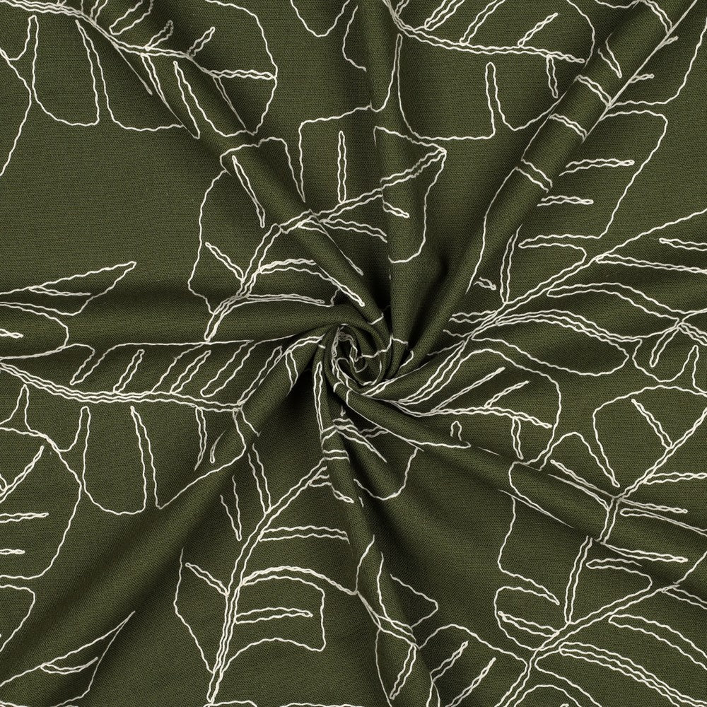 Image of linen with viscose-embroidered leaves on a green background, 210 g/m² – available at Šarlotes audumi