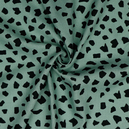 Lin avec viscose - pois noirs sur fond vert menthe foncé 180 g/m²