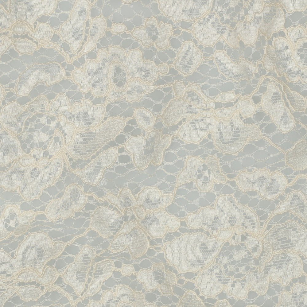 Image avec tissu en dentelle - blanc lait 130 g/m² – disponible chez Tissus de Charlotte