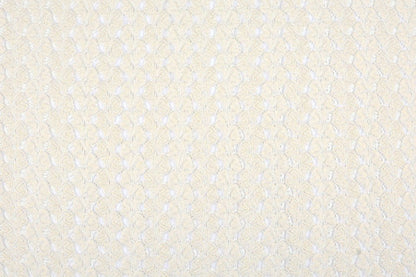 Tissu en dentelle blanc lait aux accents dorés 170 g/m²