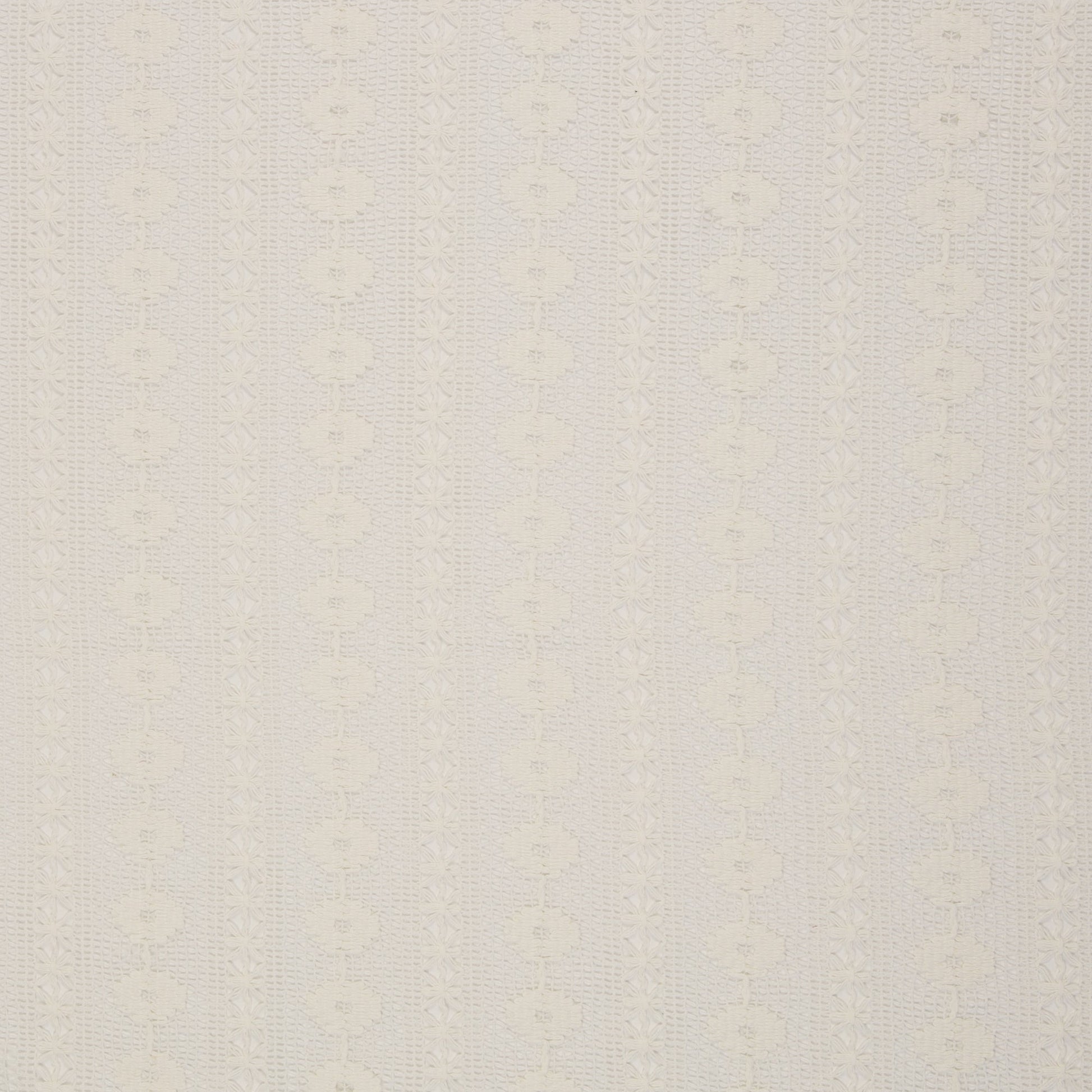Image of lace fabric, warm white with a floral pattern – available online at Charlotte's Fabrics