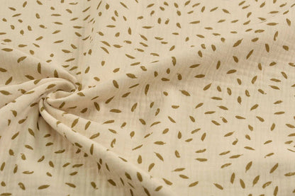 Motif petites feuilles en mousseline 125 g/m²